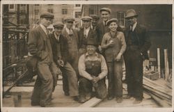 A Group of Workmen Wearing Hats Postcard