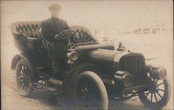 A Man Driving a Car Postcard