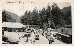 Cars and People Walking Down the Street Postcard