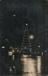 A Large Lit Metal Christmas Tree Postcard
