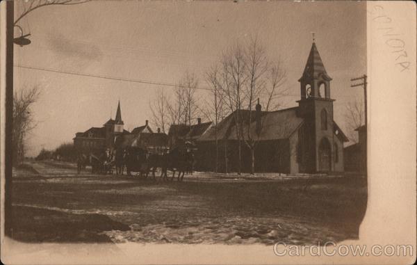 Horse Drawn Carriages Passing a Church Sonora California