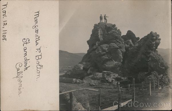 Two Men Standing on a Huge Rock Standish California