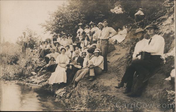 A Large Group of People Sitting on the River Bank Guerneville California