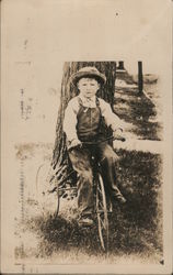 A Little Boy on a Bike Postcard