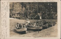 Four Boats Full of People on the River Bank Postcard