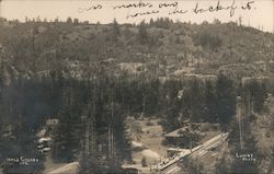A Birdseye View of a Mountain and Houses Postcard