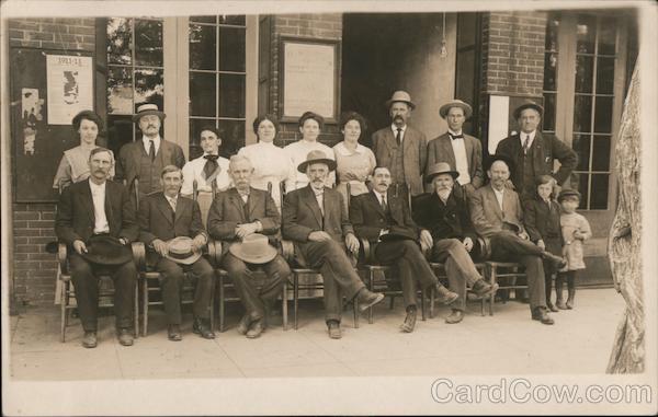 Group of People Sitting Outside a Store Front Weaverville California