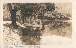 Two People on a Small Boat Postcard