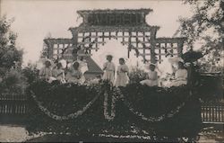 Women on a Stage of Flowers Postcard