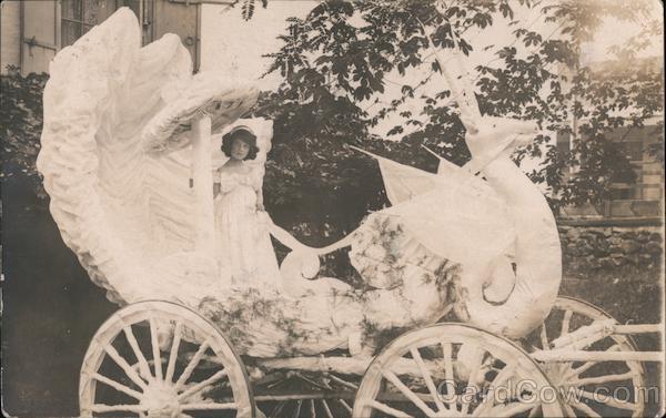 Girl in swan carriage, Parade Float Grass Valley California