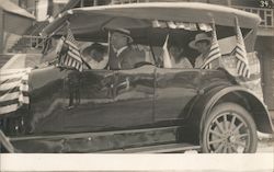 Car decorated with US Flags and bunting for parade Postcard