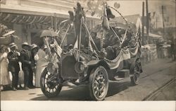 People in a Car with a Stuffed Bear on the Front Postcard