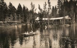 Olympia Park - People on a Row Boat in the Middle of the Water Postcard