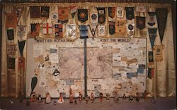 Whittier Rotarians Visit the World display of map, banners and dolls Postcard