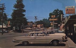 Rexall Drug and Roy's Market Postcard