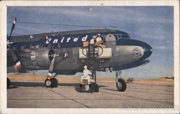 DC-6 Mainliner 300 loading packages Aircraft
