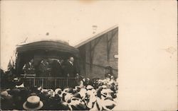 Roosevelt on back of train with large crowd of people Postcard