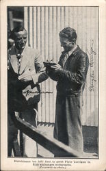 Hutchinson (on left) first to greet Flyer Corrigan in Eire exchange autographs Postcard