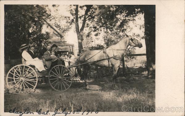 Horse drawn wagon with family posed Clayton California