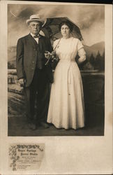 Couple Having Their Picture Made by Boyes Springs Postal Studio Postcard