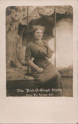 Woman With Parasol Has Her Picture Made on a Swing Postcard