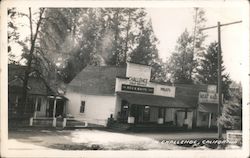 Stores along a road Postcard