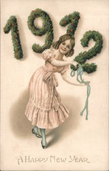 1912 A Happy New Year. Girl dancing with blue ribbon Postcard