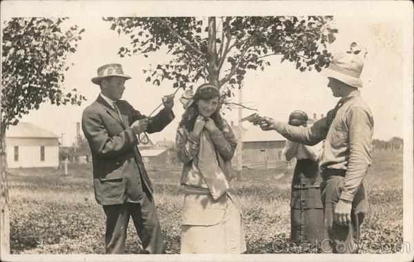 Children pretending to hang a young girl