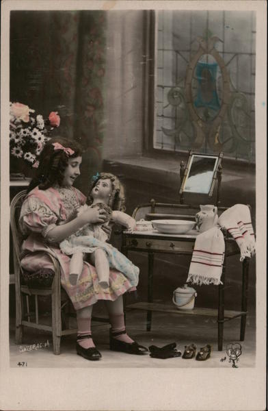 Colorized photo of girl bathing doll Dolls