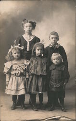 Studio photo of group of children Postcard