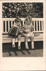 Two Children Sitting on a Bench, Accordion Postcard