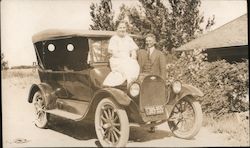Man and Woman with Car Postcard
