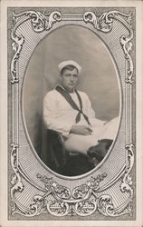 Portrait of Sailor sitting smoking. Postcard
