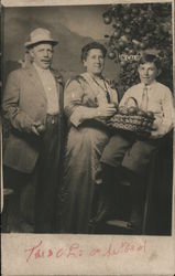 Studio family portrait with oranges Postcard