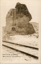 First House in Alturas Built Against This Rock Postcard