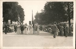 Men and Women walking in formal attire at front of parade with U.S. Flag Postcard