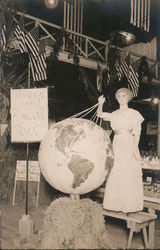 Woman Holding Earth Postcard