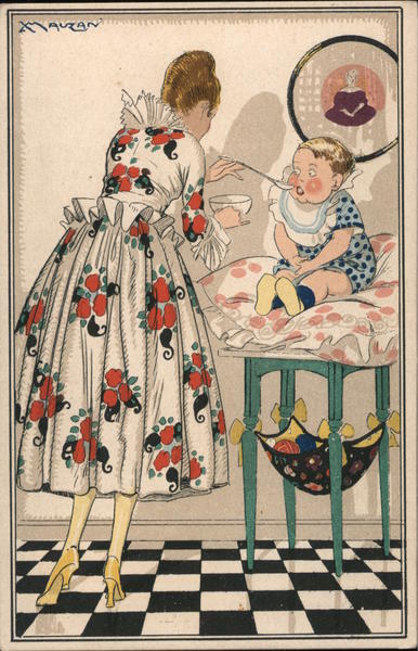 Woman in floral dress feeds baby seated on a cushion