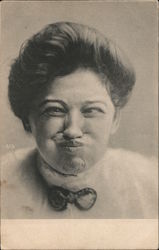 Black and white portrait of a women making a funny face. Postcard