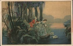 Man and lady feed swans in a lake Postcard