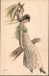 Horse nuzzles woman's neck as she sits on a tree branch Postcard