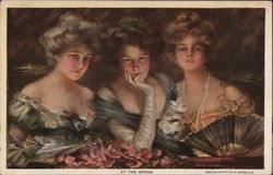 Three ladies in fancy dresses, one with pearls and a fan Postcard