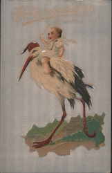 A baby rides on the back of a stork who is wearing a hat Postcard