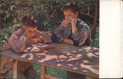 Boys sit at a table under a tree, looking intently at a book Art Nikolay Bogdanov-Belsky Postcard Postcard Postcard