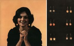 Dangle/Lite Earrings from A. Dean Watkins Co - The newest, most exciting fashion craze ever to hit the costume jewelry market Postcard