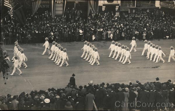 Portola Festival: White-uniformed people marching in formation San Francisco California