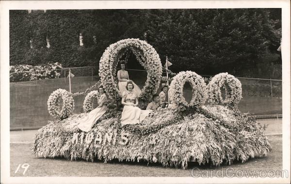 Kioanis Float in the Rose Parade, with Three Ladies Seated Around the Float Pasadena California
