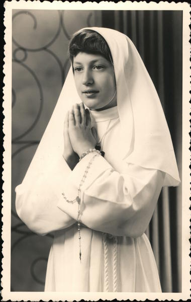 Young woman in a nun's habit Religious