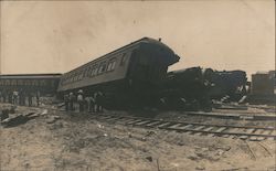 Derailed Train while men stand and look Postcard