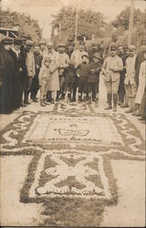 Group with Floral Display on Ground? France Postcard Postcard Postcard
